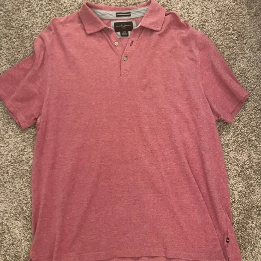 Salmon red polo shirt